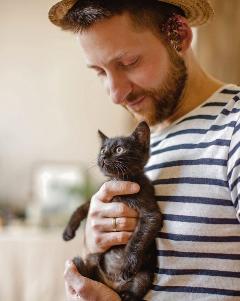 tutor_com_seu_gato_no_colo